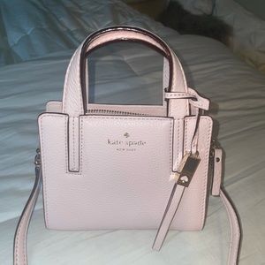 Mini light pink Kate Spade crossbody bag